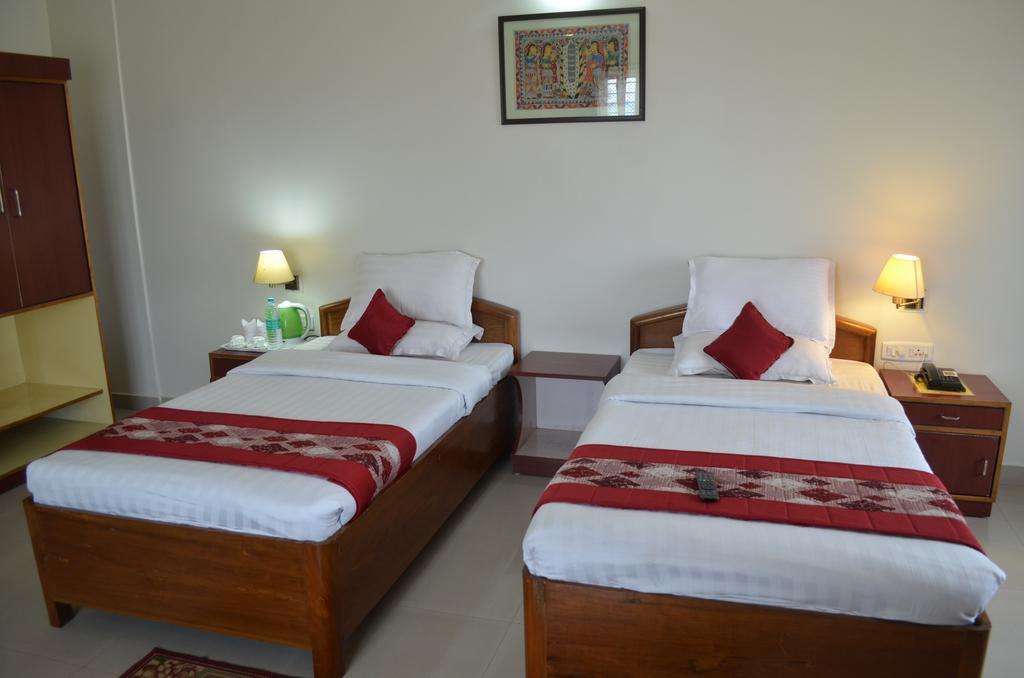 Hotel Rajdhani Regency Гувахати Номер фото
