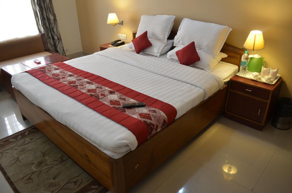 Hotel Rajdhani Regency Гувахати Номер фото